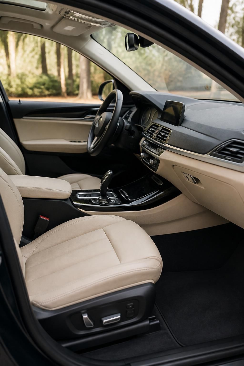 A spotless car interior with clean seats and dashboard detailing.